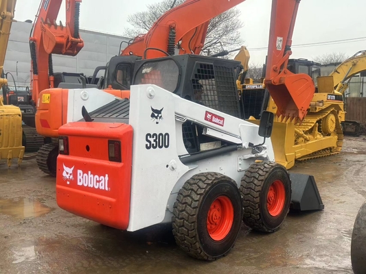Χρησιμοποιούμενος φορτιστής Bobcat S300 Mini Skid Steer, μεταχειρισμένος φορτιστής Bobcat Skid 1m3 60KW